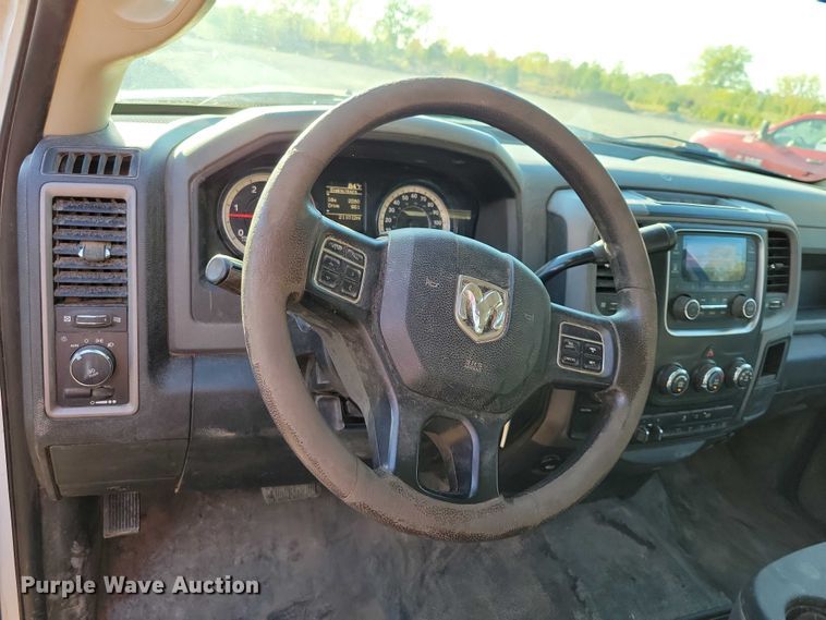 image for item EA2646 2017 RAM 5500 Crew Cab flatbed truck