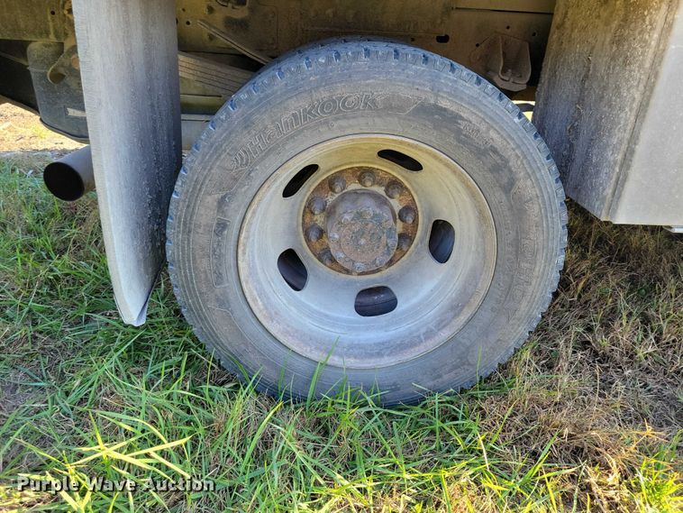 image for item EA2646 2017 RAM 5500 Crew Cab flatbed truck