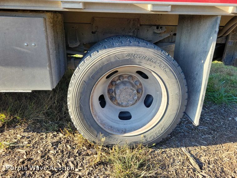 image for item EA2646 2017 RAM 5500 Crew Cab flatbed truck