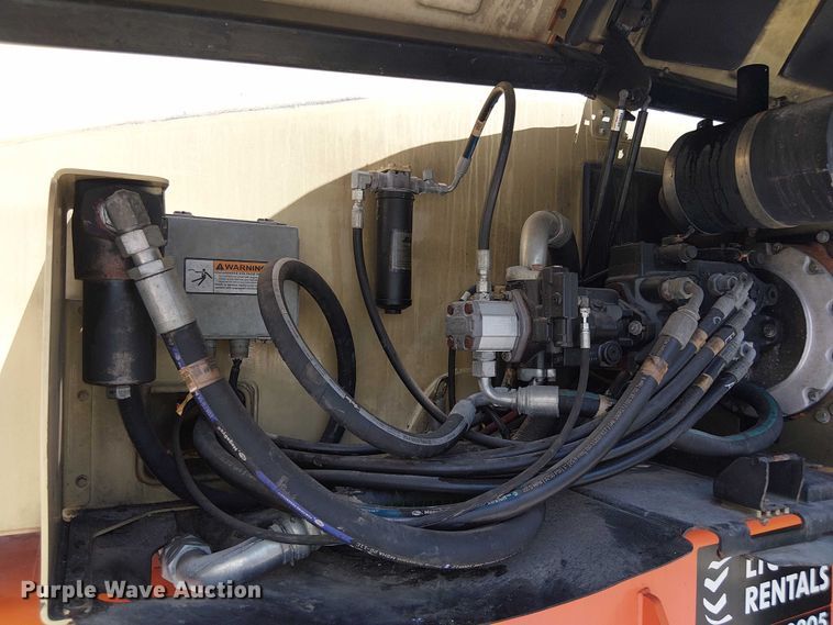 image for item EC3812 2010 JLG 1250AJP boom lift