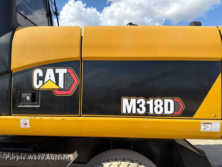 image for item ED5963 2011 Caterpillar M318D wheeled excavator