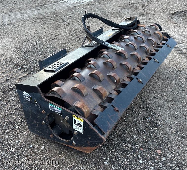 image for item EE4051 John Deere HE200  skid steer vibratory drum roller