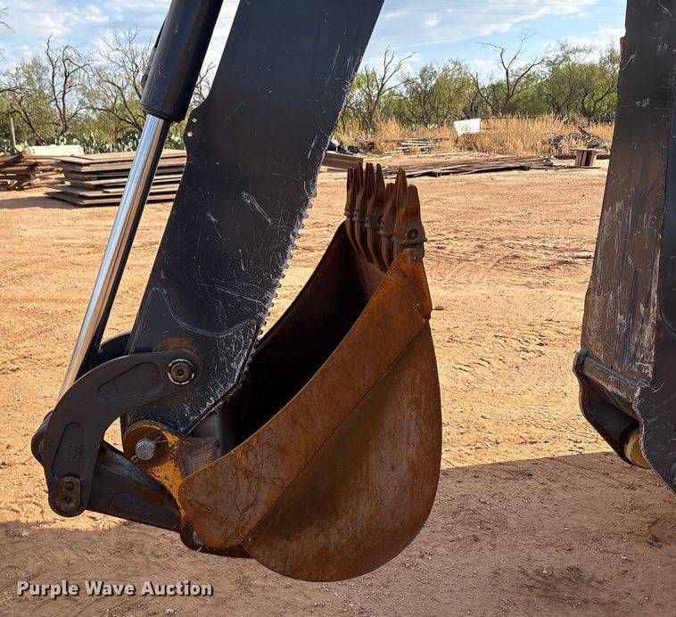 image for item EF6075 2014 John Deere 310SK backhoe