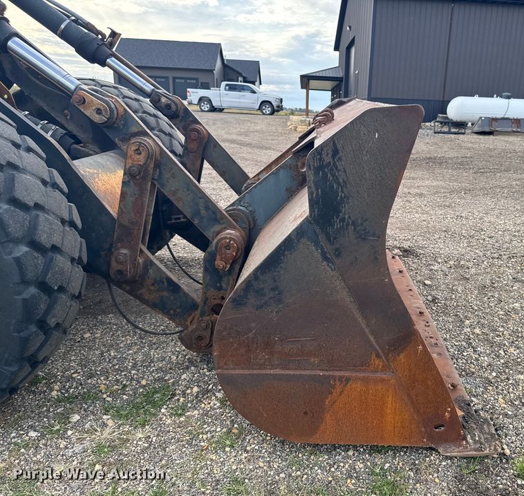 image for item EM2383 John Deere TC54H wheel loader