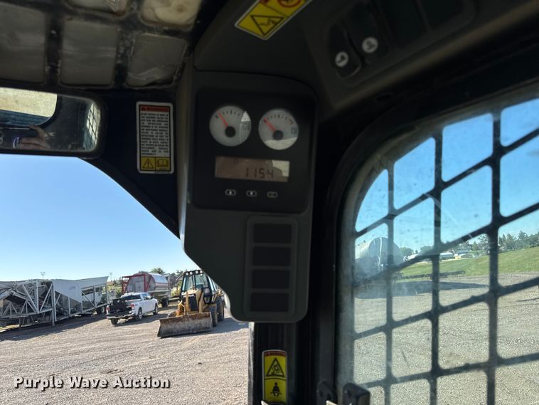 image for item EM2397 2011 Caterpillar 246C skid steer loader