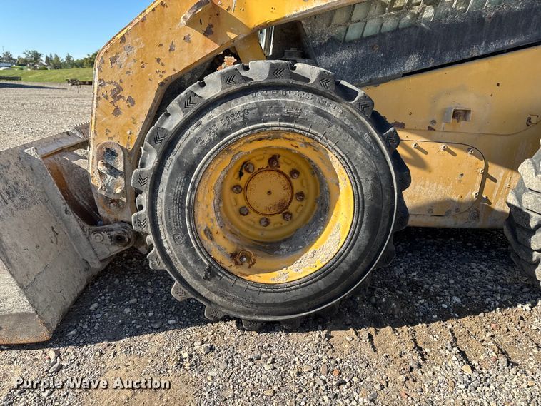image for item EM2397 2011 Caterpillar 246C skid steer loader