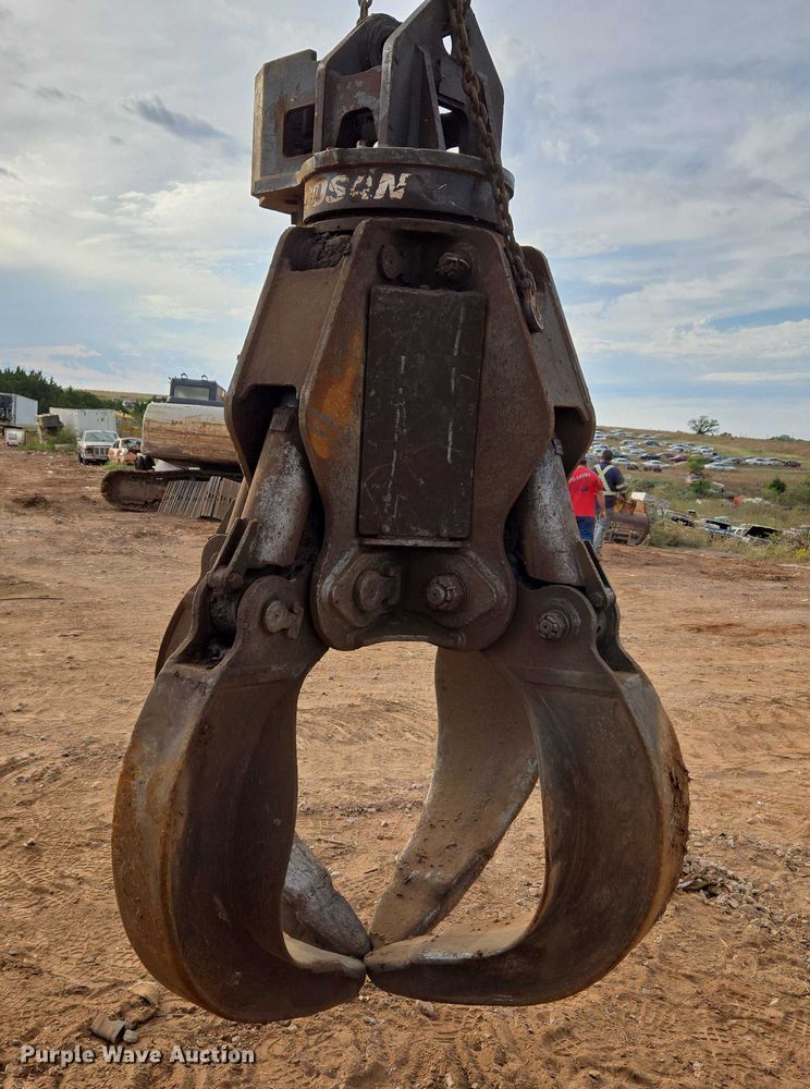 image for item EU3861 2014 DOOSAN DXG4063  scrap grapple