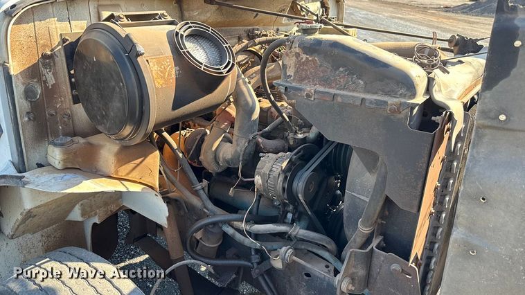 image for item EU5016 1990 International 4700  dump flatbed truck