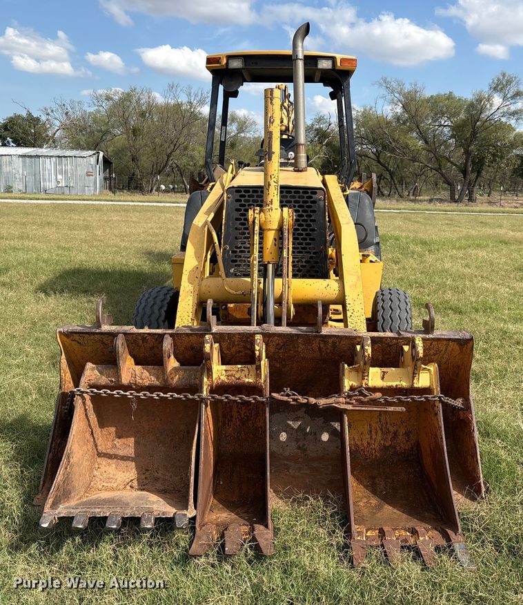 image for item IE9237 1998 John Deere 310E backhoe