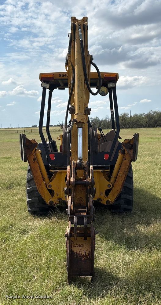 image for item IE9237 1998 John Deere 310E backhoe