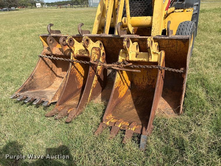 image for item IE9237 1998 John Deere 310E backhoe