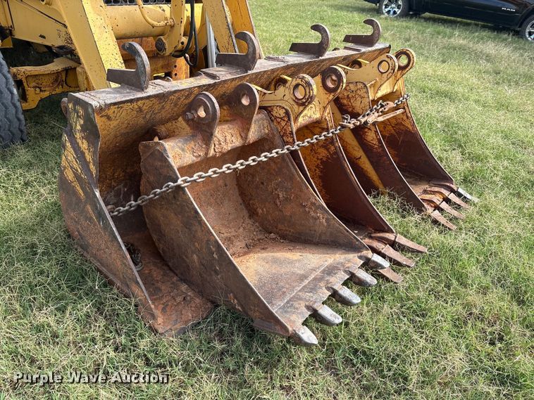 image for item IE9237 1998 John Deere 310E backhoe