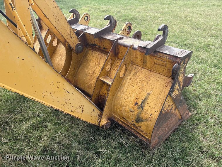 image for item IE9237 1998 John Deere 310E backhoe