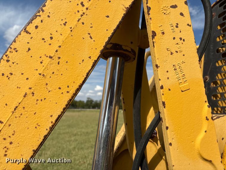 image for item IE9237 1998 John Deere 310E backhoe