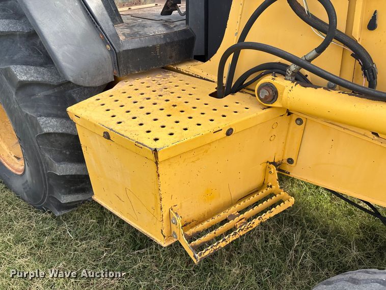 image for item IE9237 1998 John Deere 310E backhoe