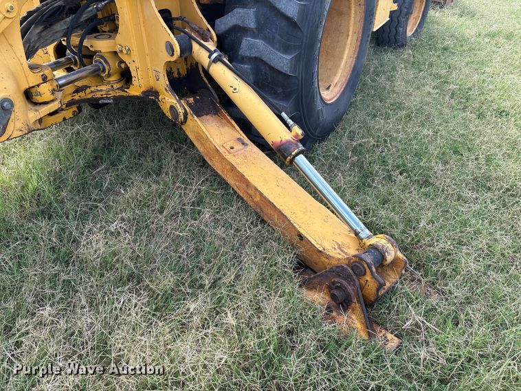 image for item IE9237 1998 John Deere 310E backhoe