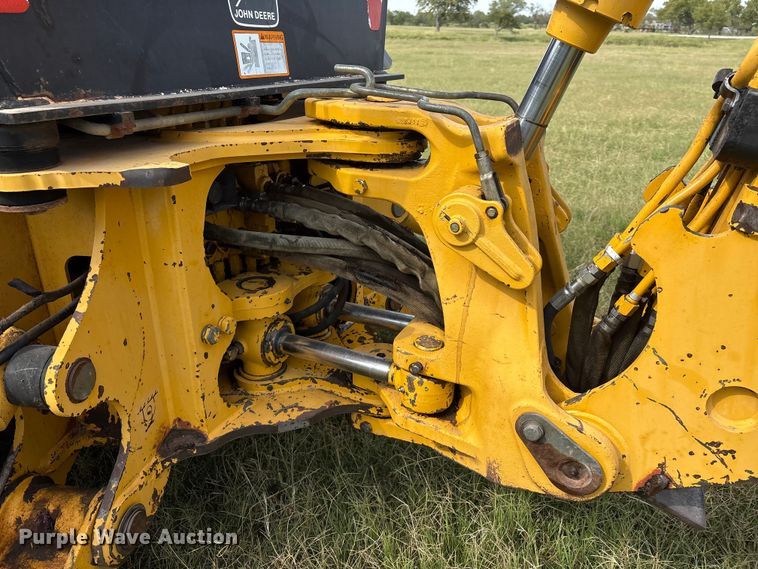 image for item IE9237 1998 John Deere 310E backhoe