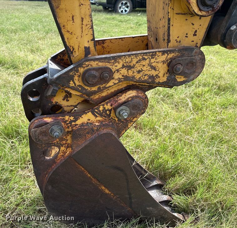 image for item IE9237 1998 John Deere 310E backhoe