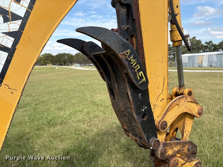 image for item IE9237 1998 John Deere 310E backhoe