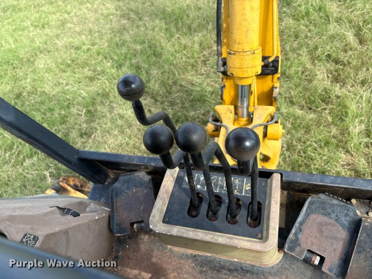 image for item IE9237 1998 John Deere 310E backhoe