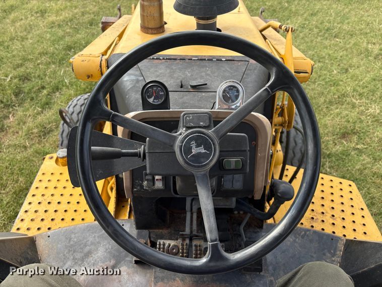 image for item IE9237 1998 John Deere 310E backhoe