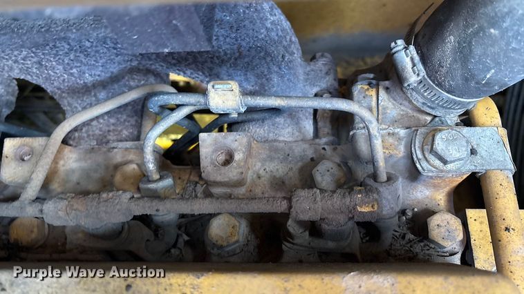 image for item IE9237 1998 John Deere 310E backhoe