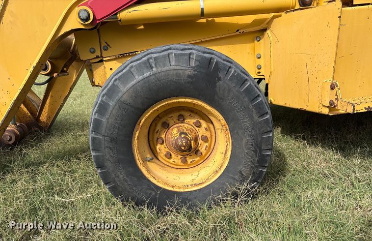 image for item IE9237 1998 John Deere 310E backhoe