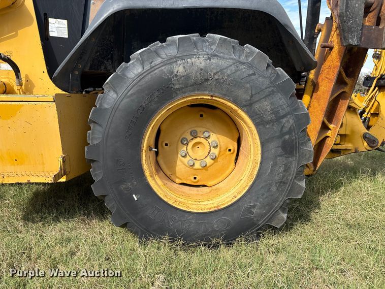 image for item IE9237 1998 John Deere 310E backhoe