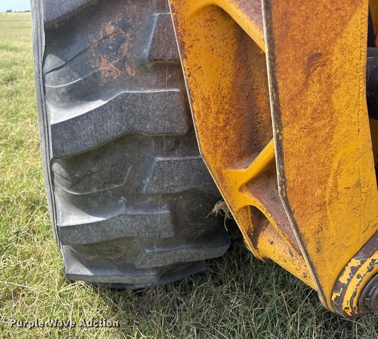 image for item IE9237 1998 John Deere 310E backhoe