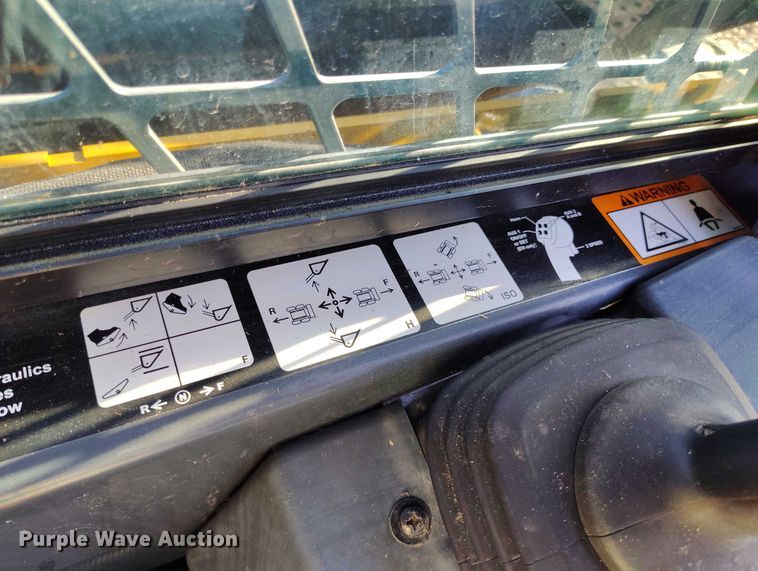 image for item IP9711 2017 John Deere 320E skid steer loader