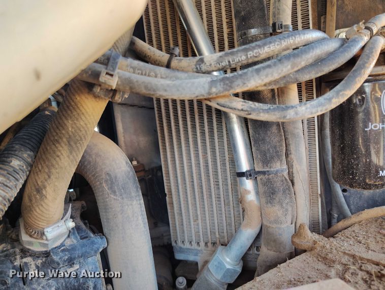 image for item IP9711 2017 John Deere 320E skid steer loader