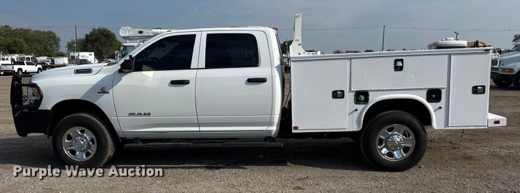 image for item NU9654 2022 Dodge Ram  3500HD Crew Cab utility bed pickup truck
