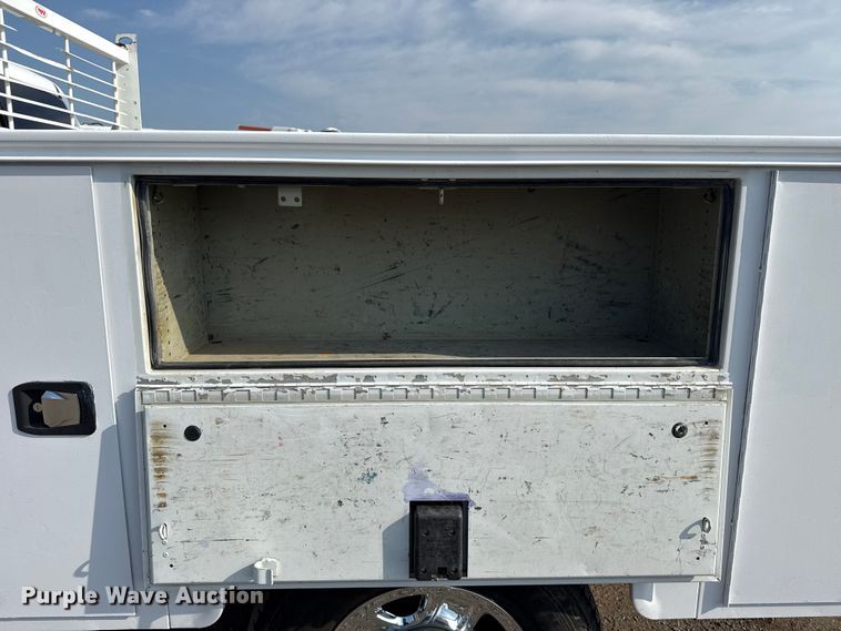 image for item NU9654 2022 Dodge Ram  3500HD Crew Cab utility bed pickup truck