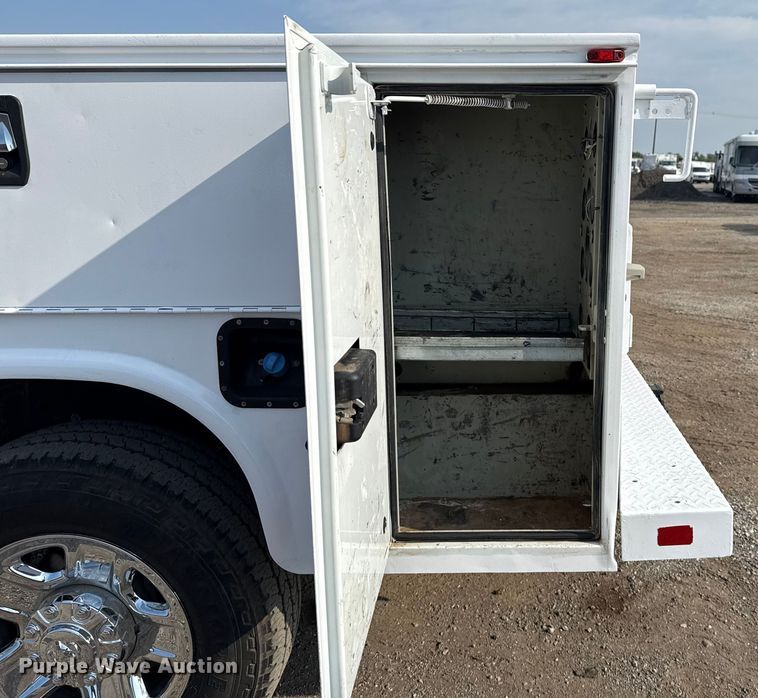 image for item NU9654 2022 Dodge Ram  3500HD Crew Cab utility bed pickup truck