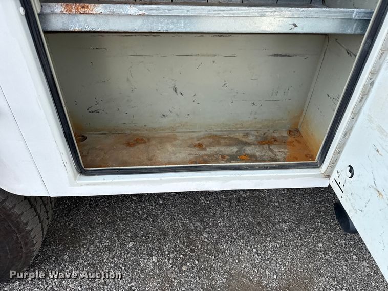 image for item NU9654 2022 Dodge Ram  3500HD Crew Cab utility bed pickup truck