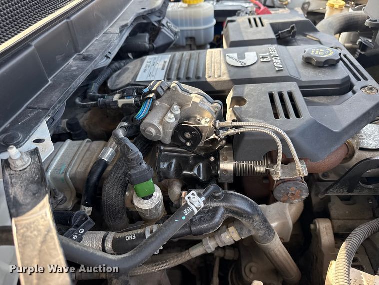 image for item NU9654 2022 Dodge Ram  3500HD Crew Cab utility bed pickup truck