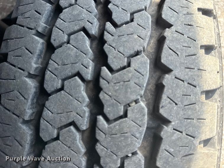 image for item NU9654 2022 Dodge Ram  3500HD Crew Cab utility bed pickup truck