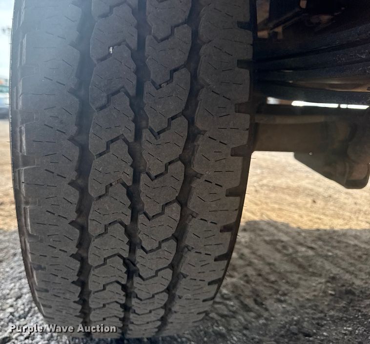 image for item NU9654 2022 Dodge Ram  3500HD Crew Cab utility bed pickup truck