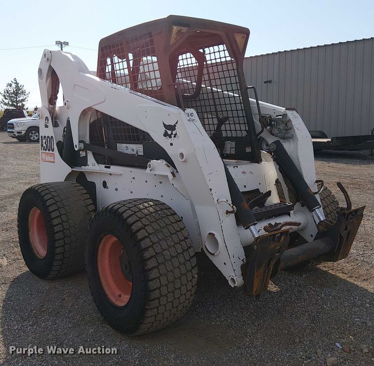 MINI CARGADOR SOBRE RUEDAS 2009 BOBCAT A300