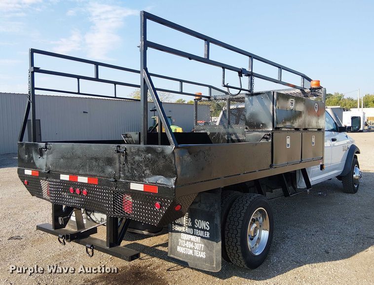 image for item NU9726 2013 RAM 5500 Crew Cab flatbed truck
