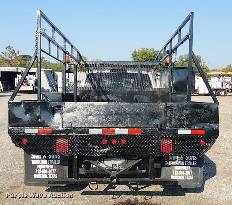 image for item NU9726 2013 RAM 5500 Crew Cab flatbed truck