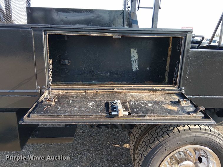 image for item NU9726 2013 RAM 5500 Crew Cab flatbed truck