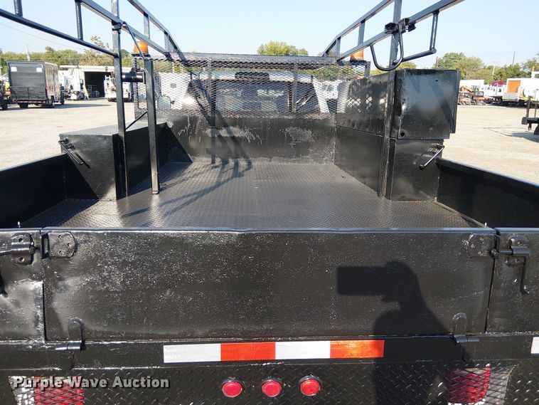 image for item NU9726 2013 RAM 5500 Crew Cab flatbed truck