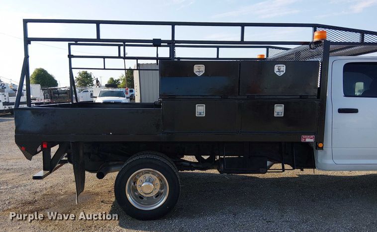 image for item NU9726 2013 RAM 5500 Crew Cab flatbed truck
