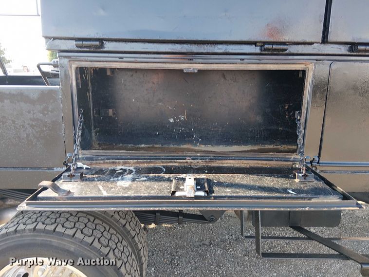 image for item NU9726 2013 RAM 5500 Crew Cab flatbed truck