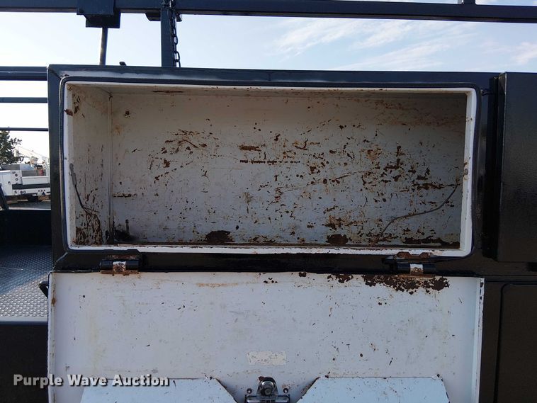 image for item NU9726 2013 RAM 5500 Crew Cab flatbed truck