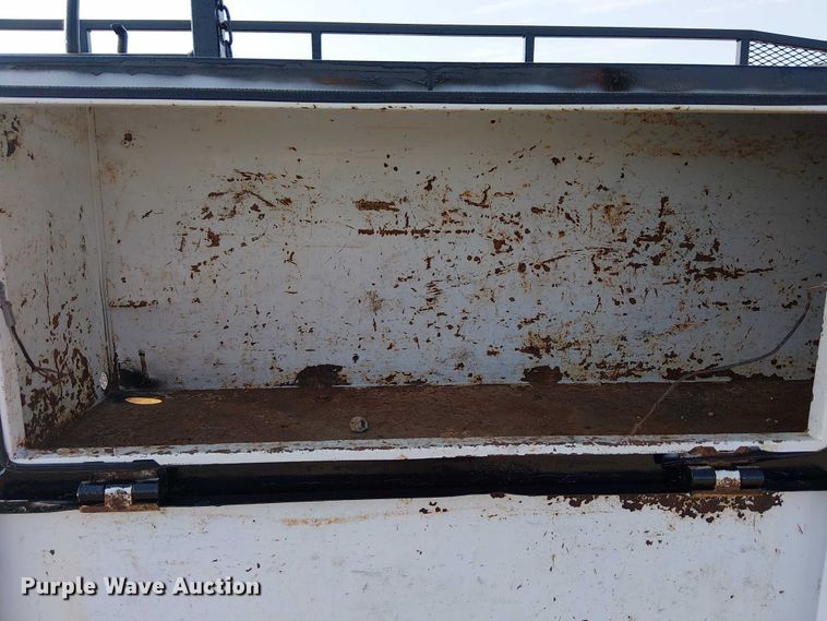 image for item NU9726 2013 RAM 5500 Crew Cab flatbed truck