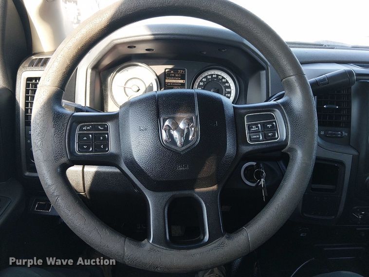 image for item NU9726 2013 RAM 5500 Crew Cab flatbed truck