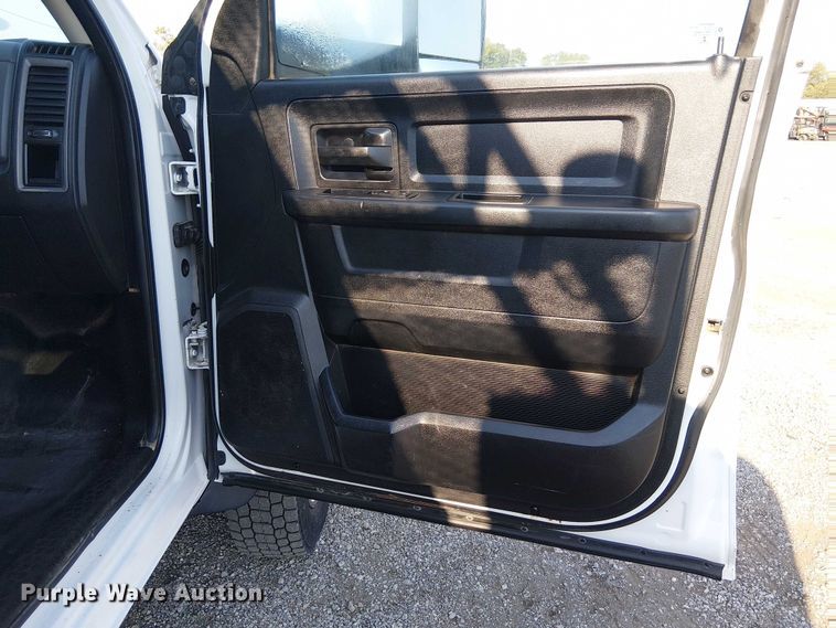 image for item NU9726 2013 RAM 5500 Crew Cab flatbed truck