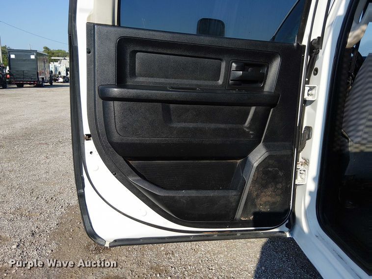 image for item NU9726 2013 RAM 5500 Crew Cab flatbed truck